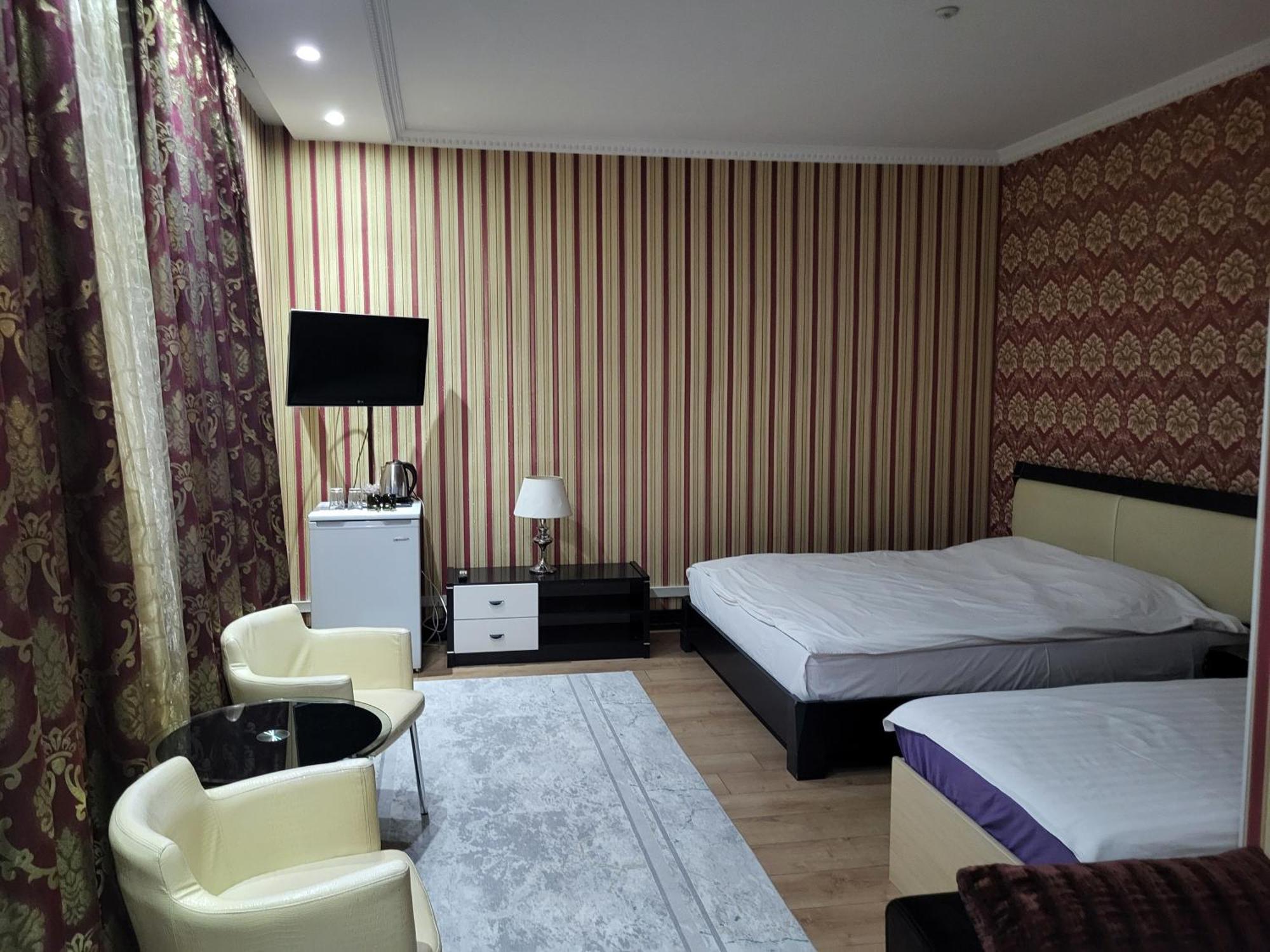 Seoul Hotel Шимкент Стая снимка