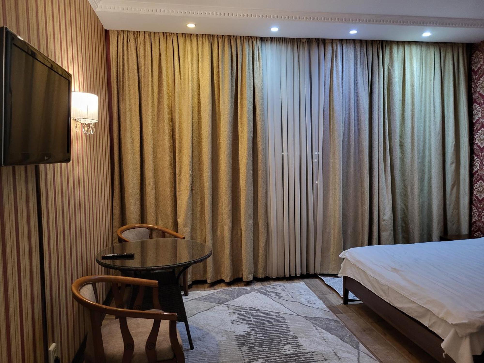 Seoul Hotel Шимкент Стая снимка